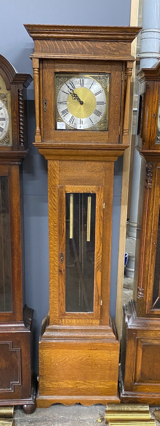 An oak longcase clock, with a square brass and silvered dial, height 203cm